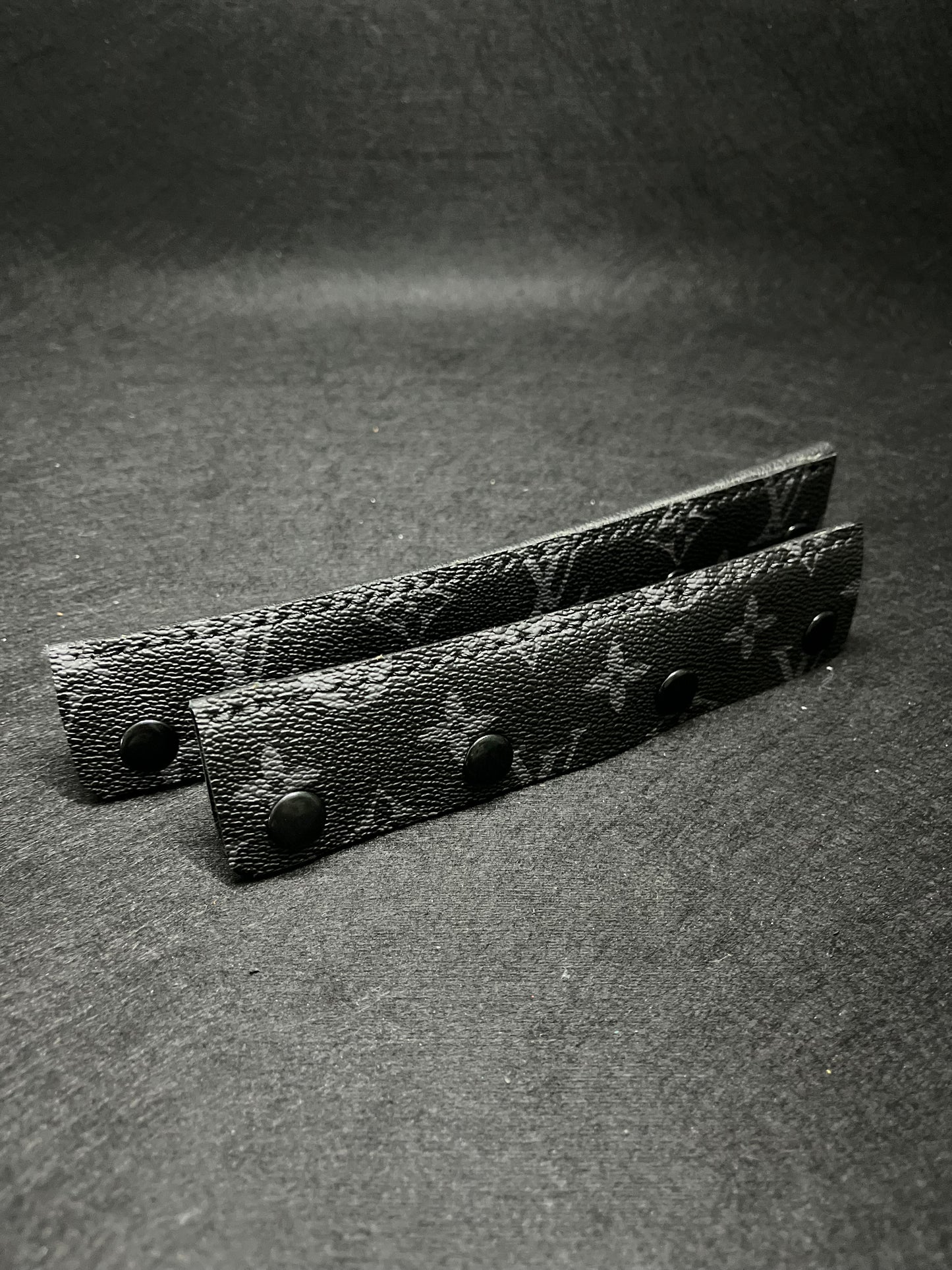 Black pair of lv headbands