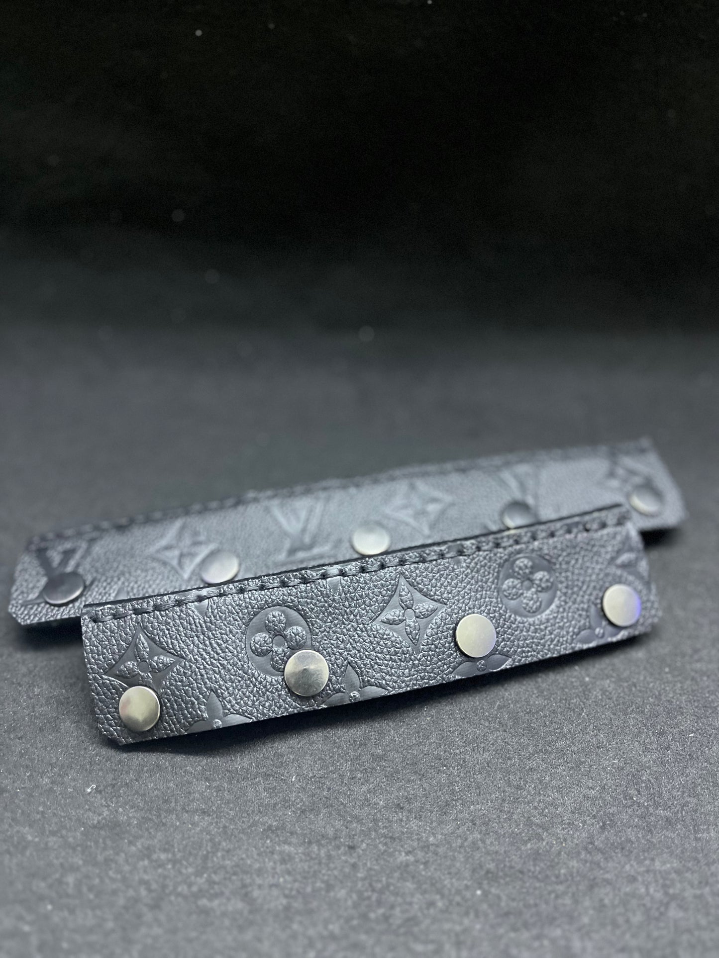 A set of black LV print headbands