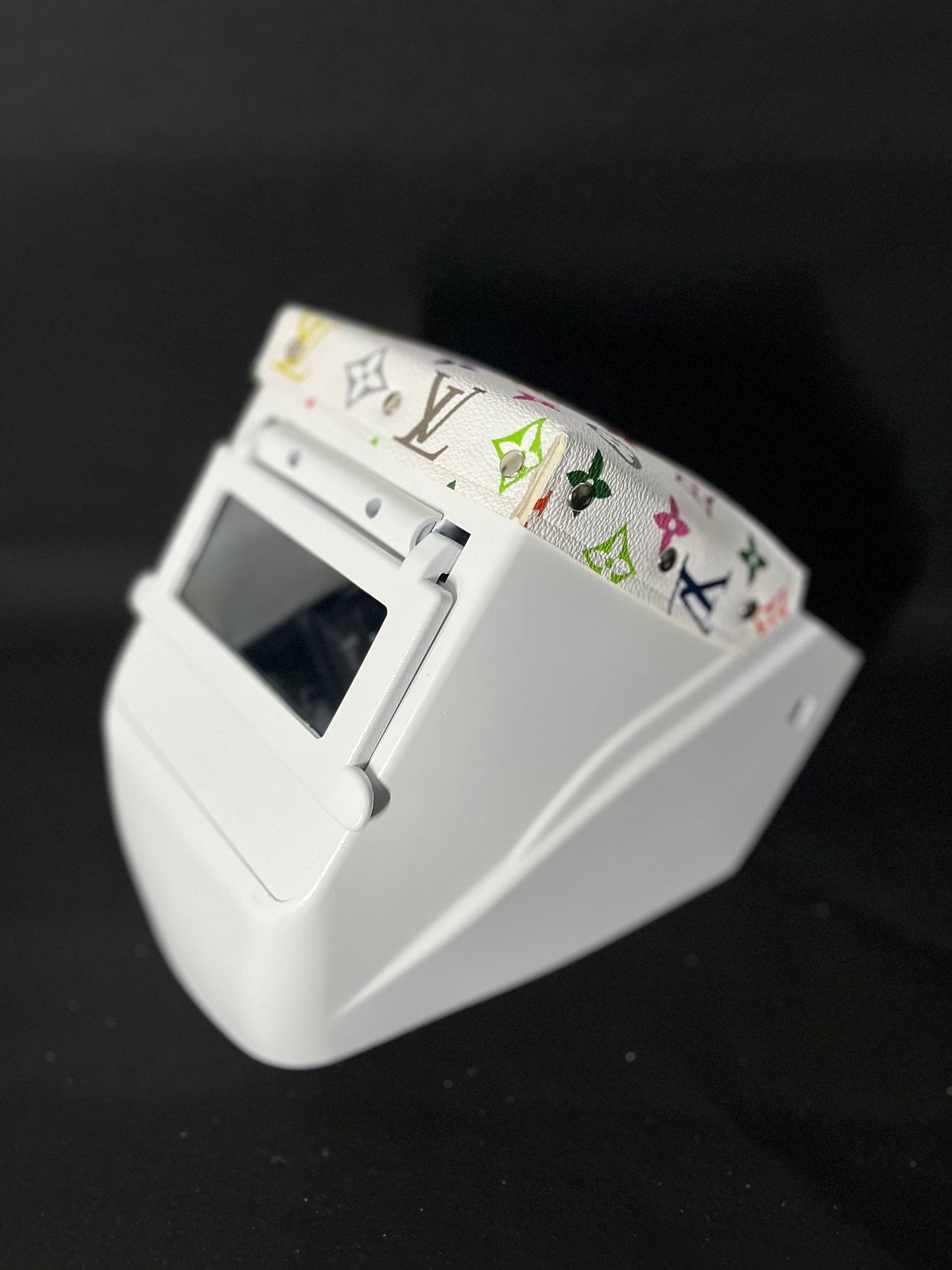 white hood with a multicolor LV top