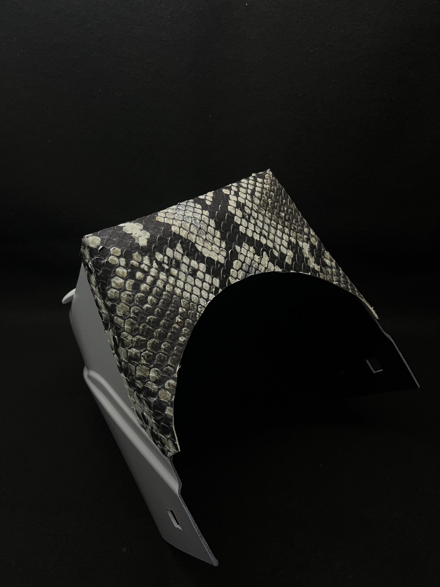 White hood with a king snake print top bib