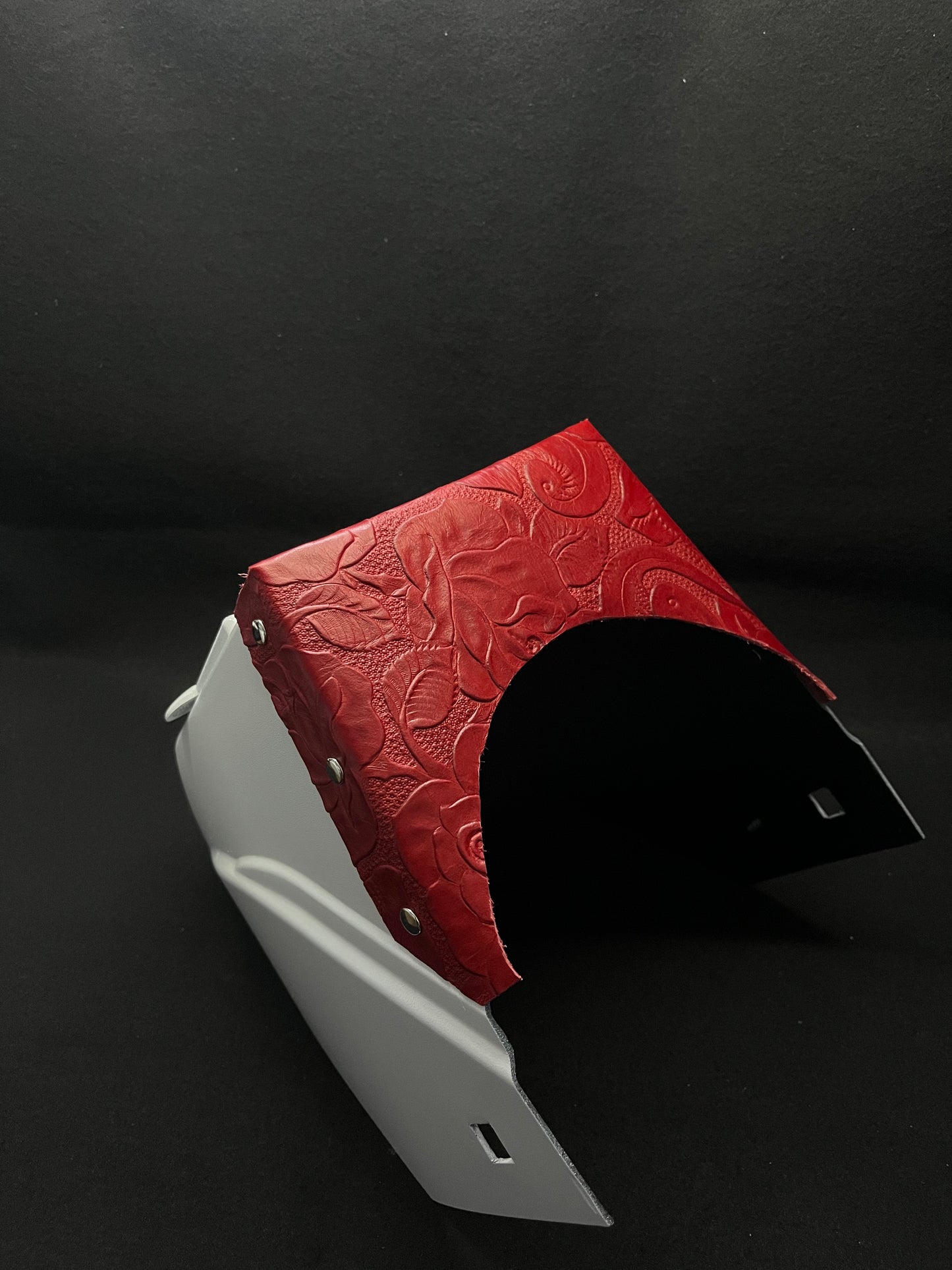 White hood with a red floral top