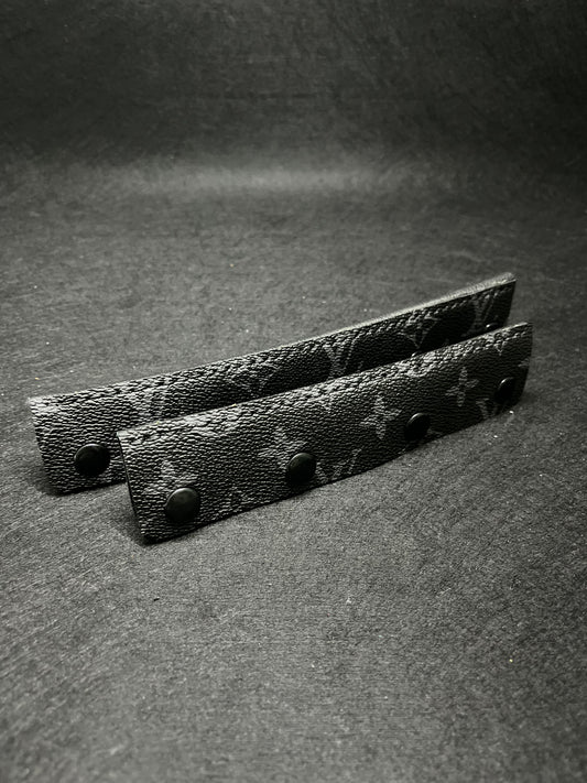 Black pair of lv headbands