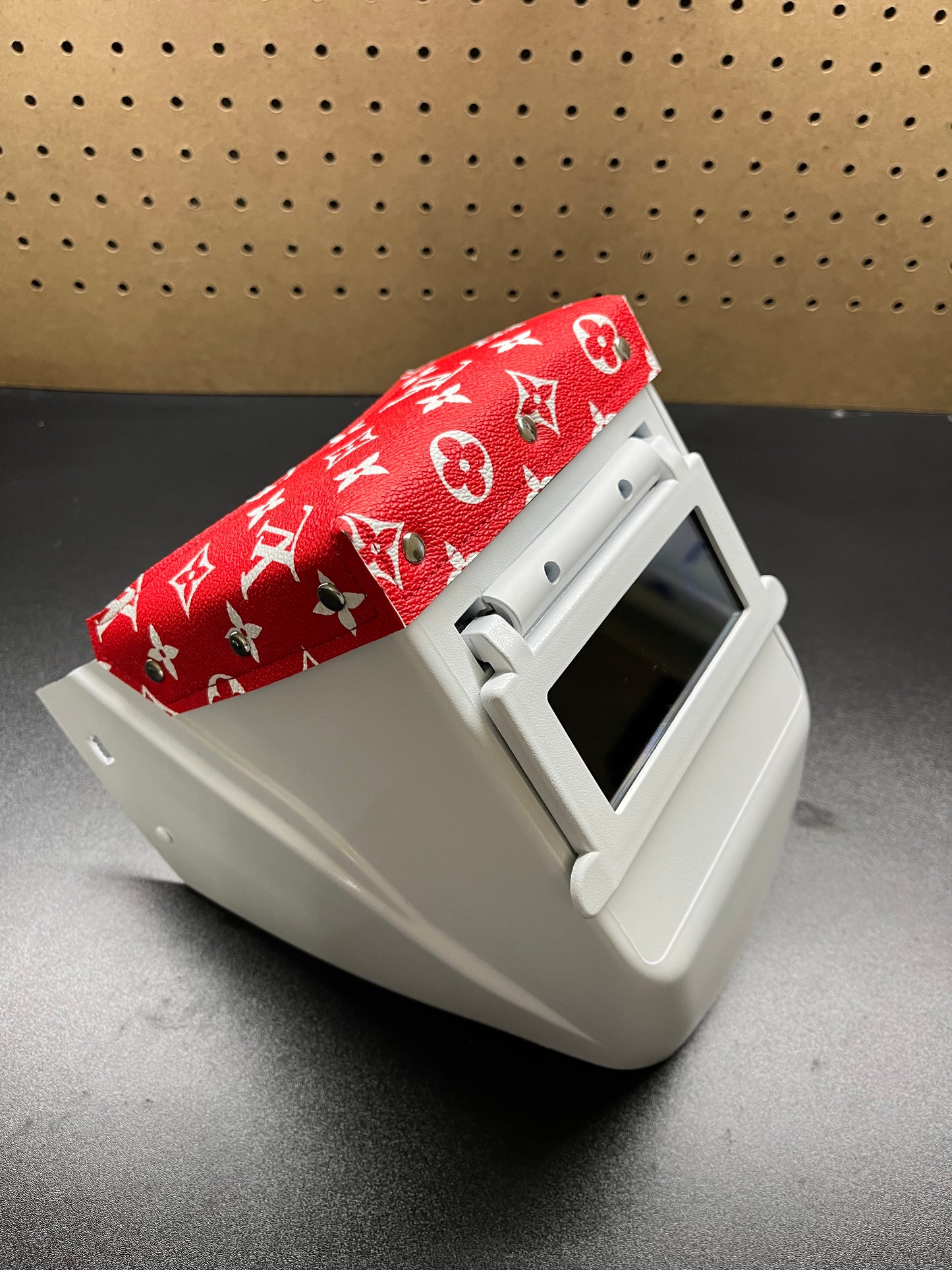 White hood with red top