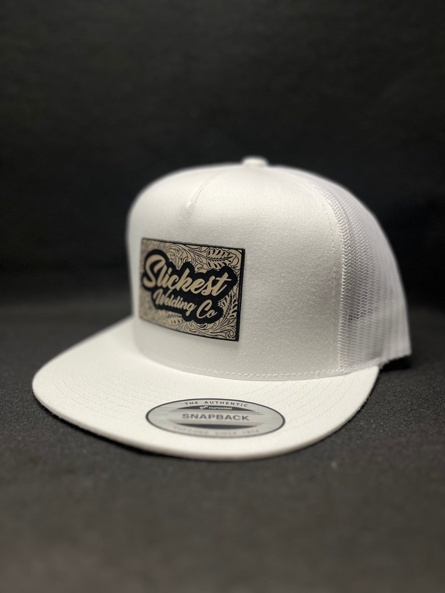 White hat with a tan patch