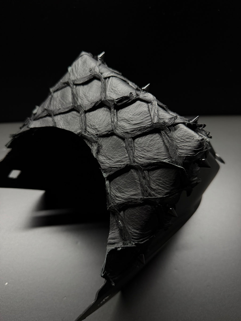 triple black pirarucu square hood with spikes