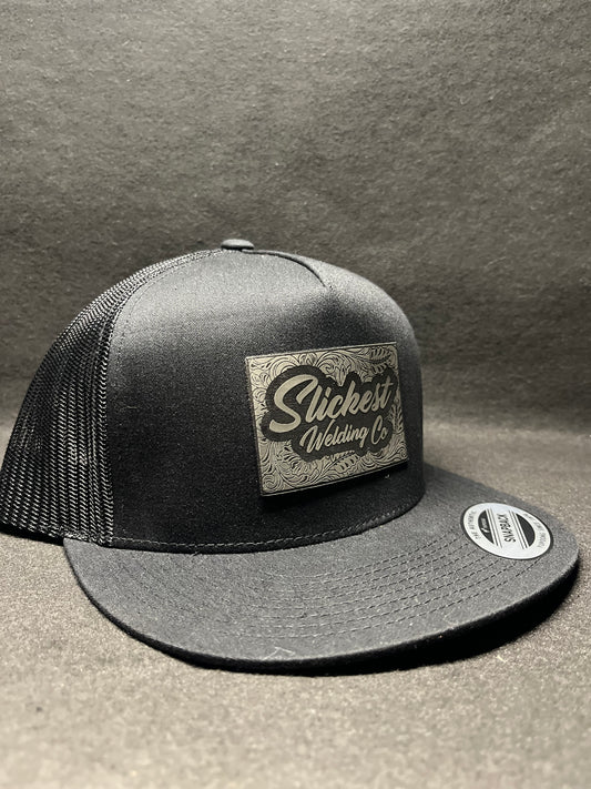 Black hat with dark grey patch