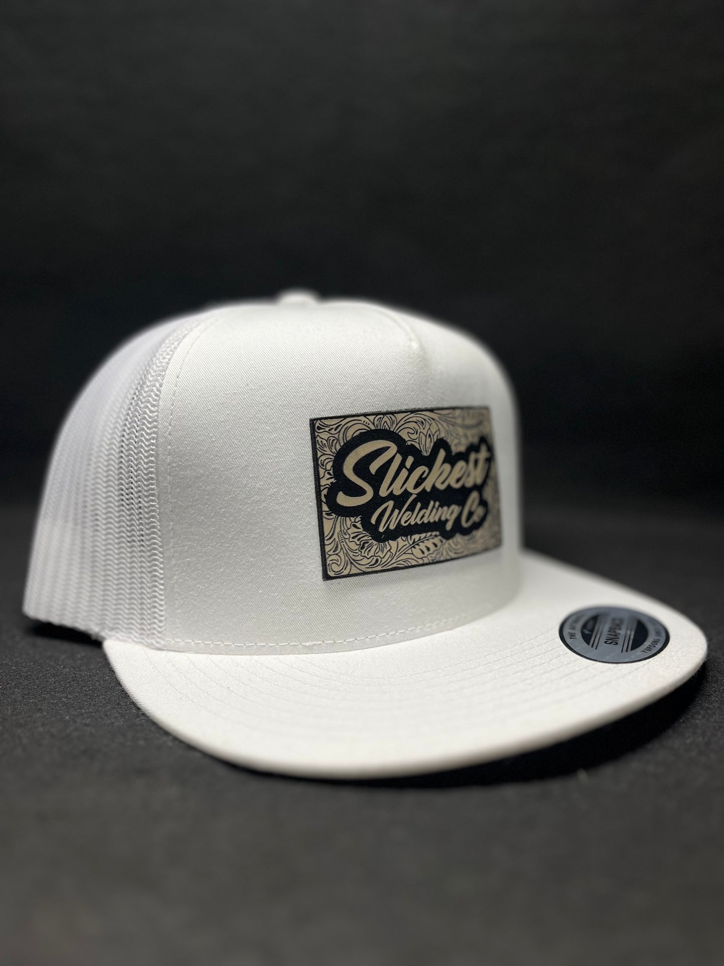 White hat with a tan patch