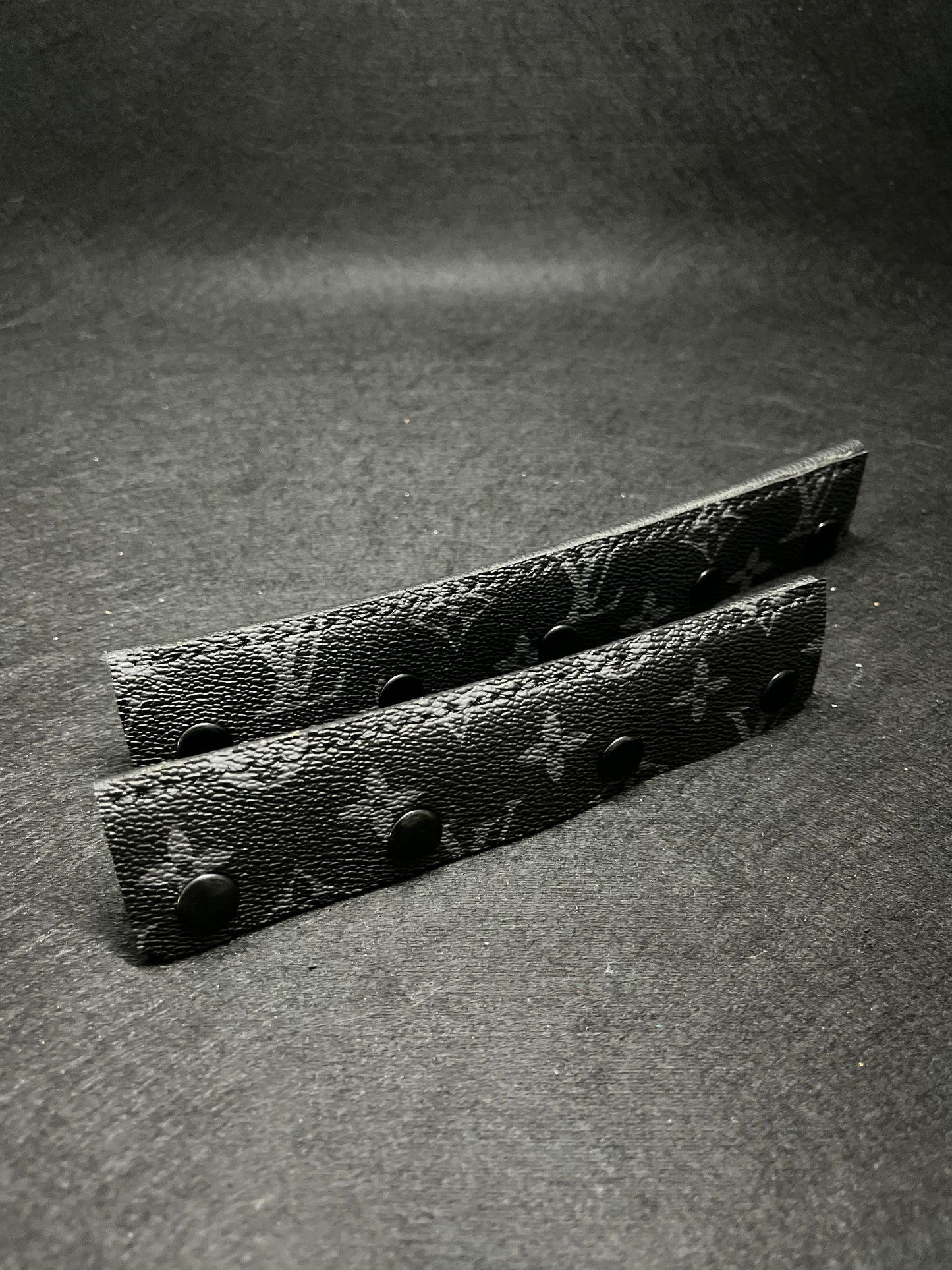 Black pair of lv headbands