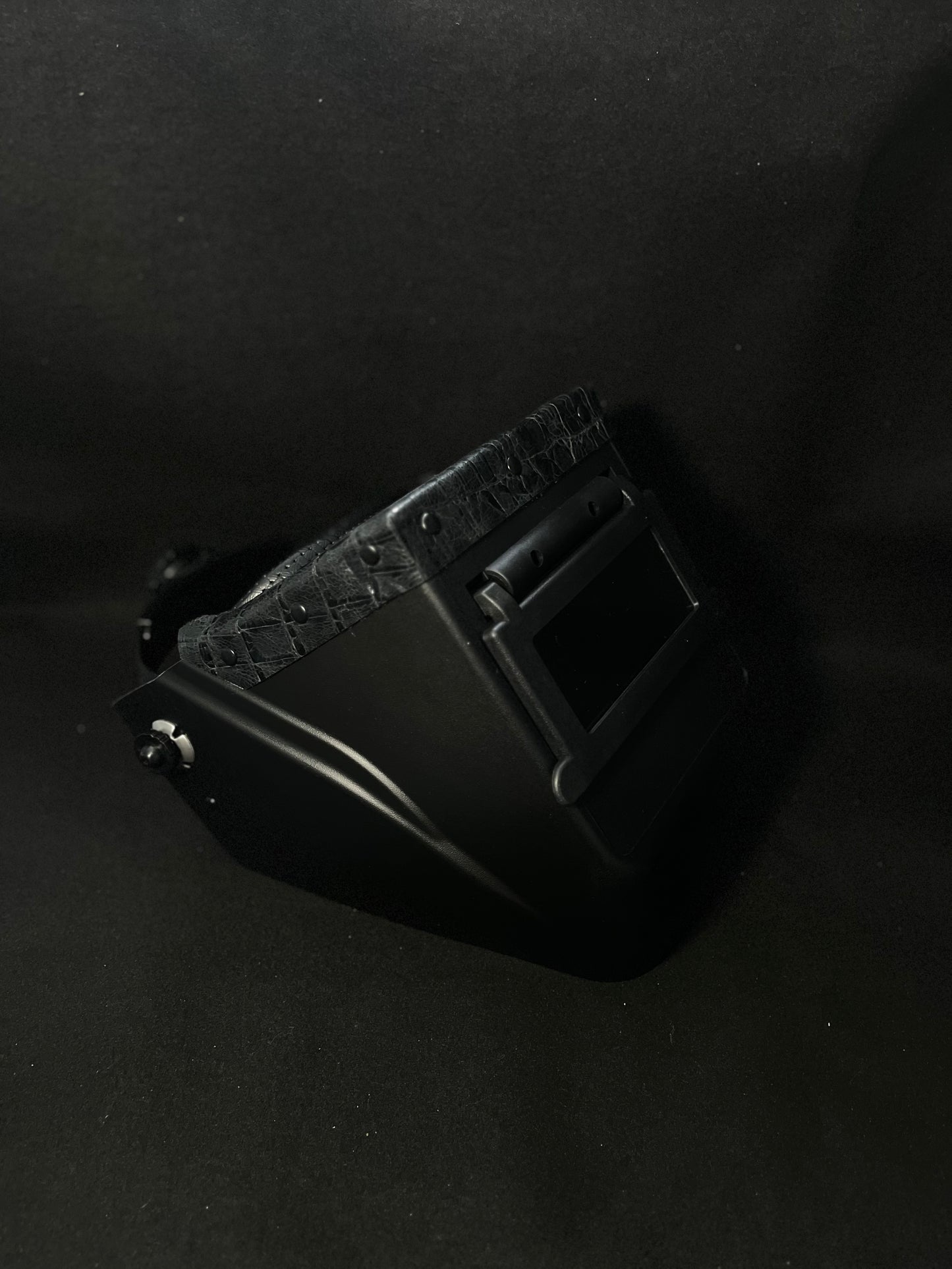 Black hood with a black gator top bib