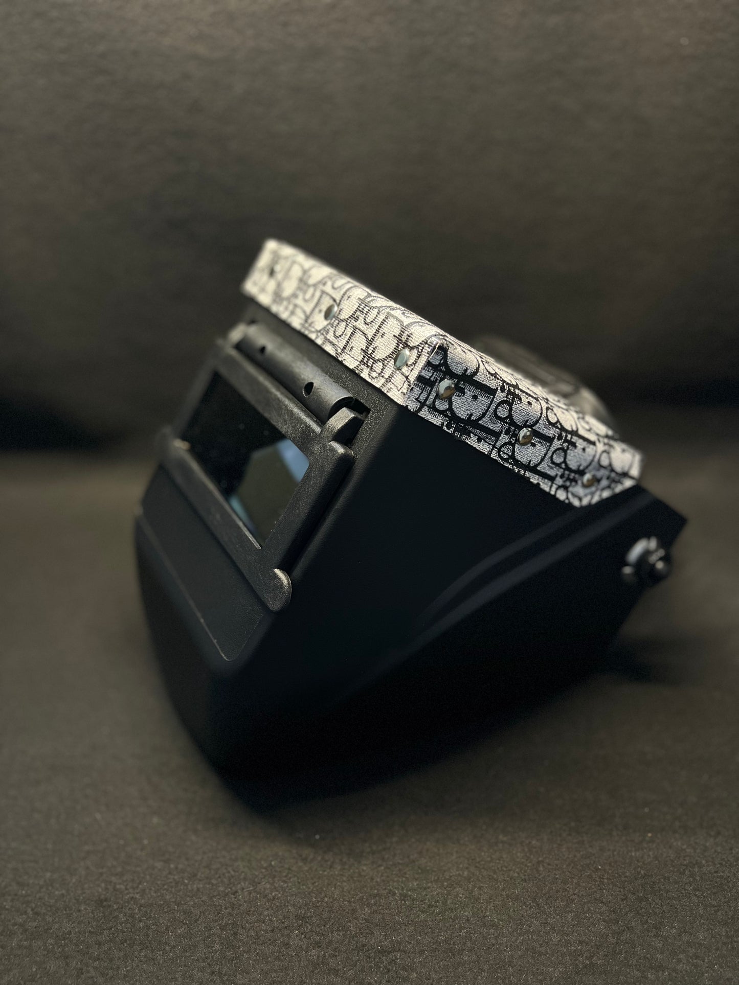 Black hood with a CD top bib