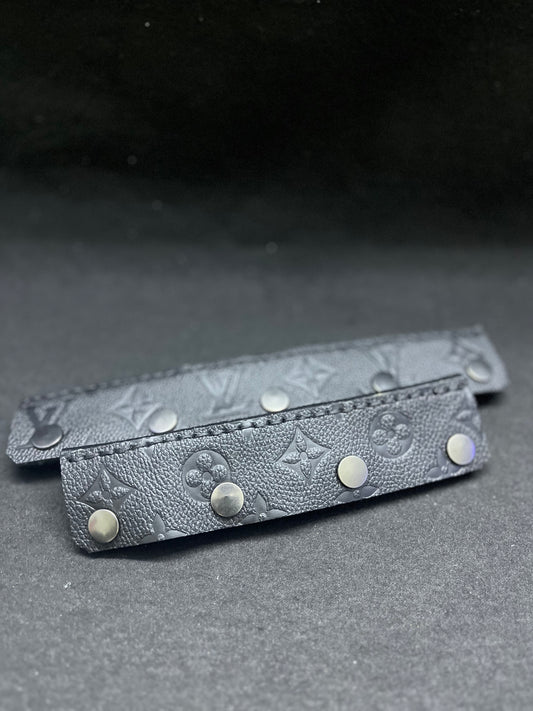 A set of black LV print headbands