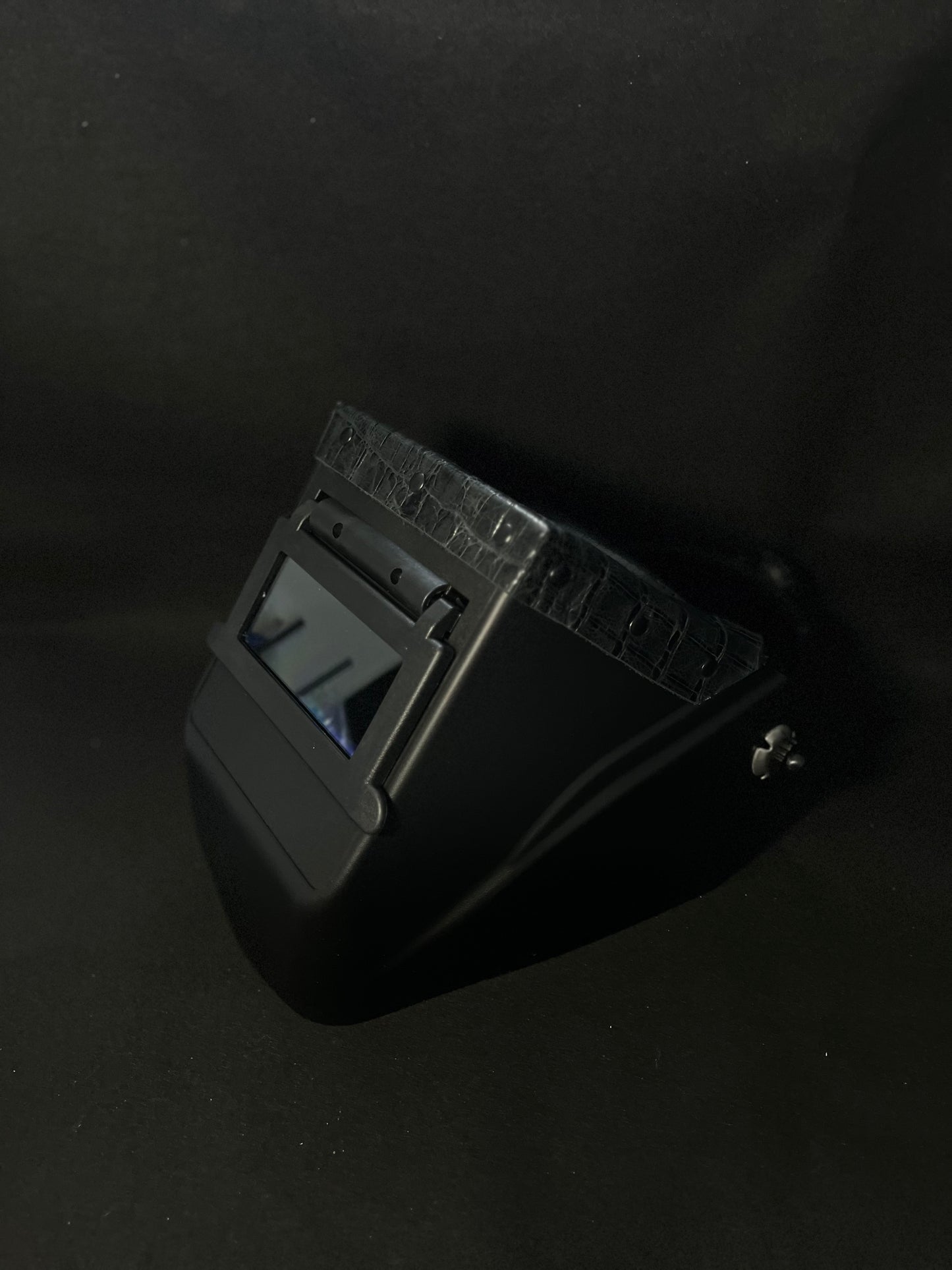 Black hood with a black gator top bib