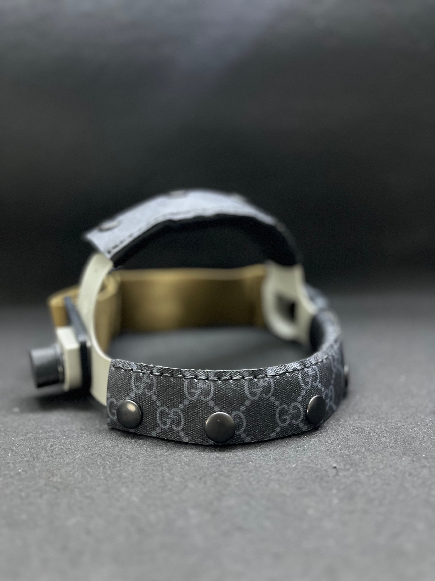 A set of black Gucci headbands