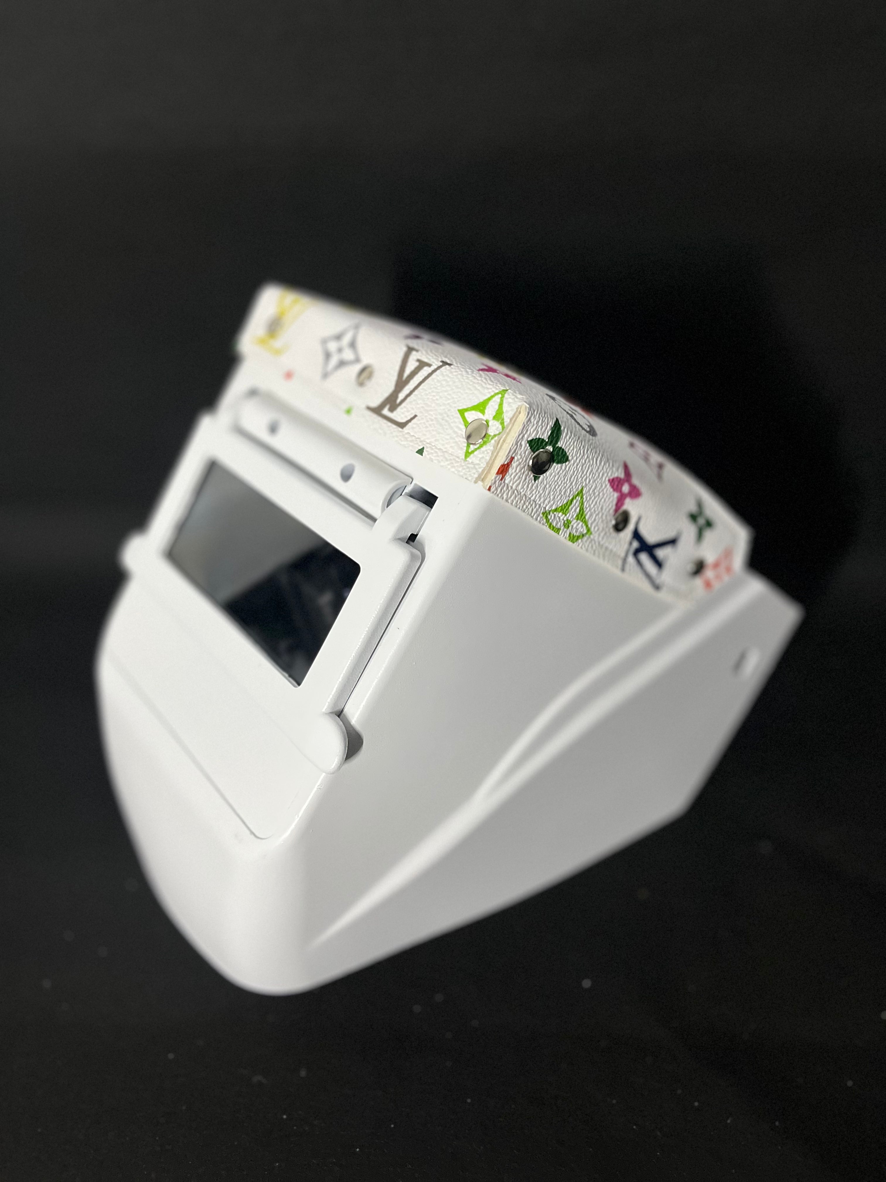 white hood with a multicolor LV top