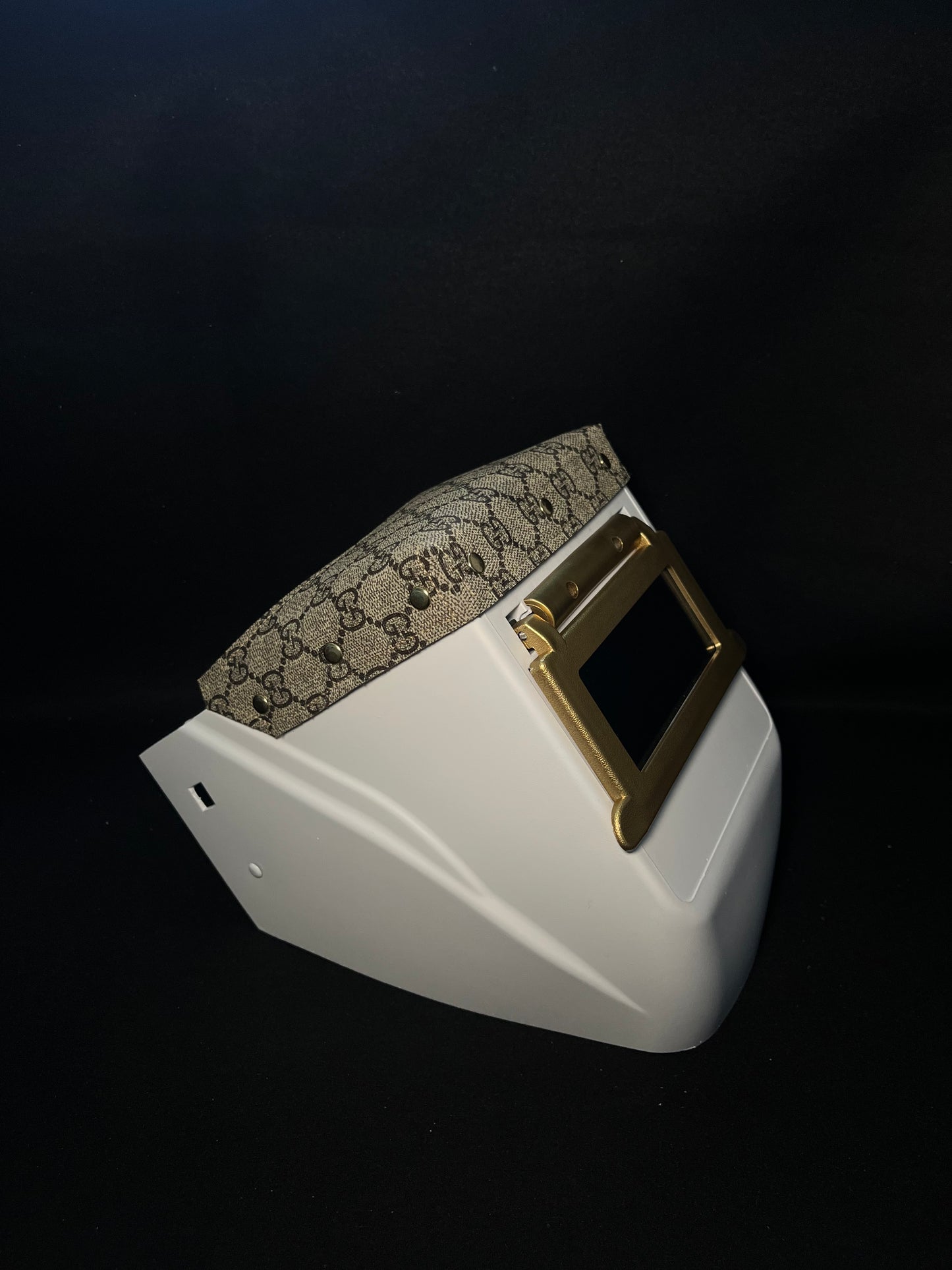 White hood with a gucci top bib and gold accents