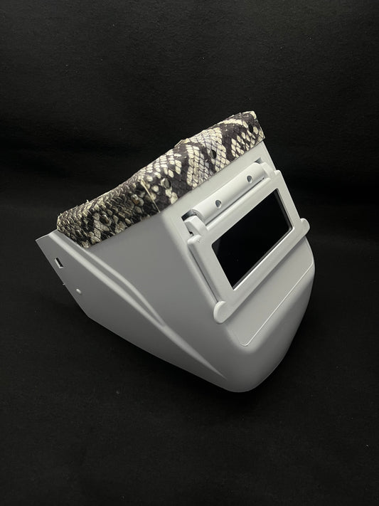 White hood with a king snake print top bib