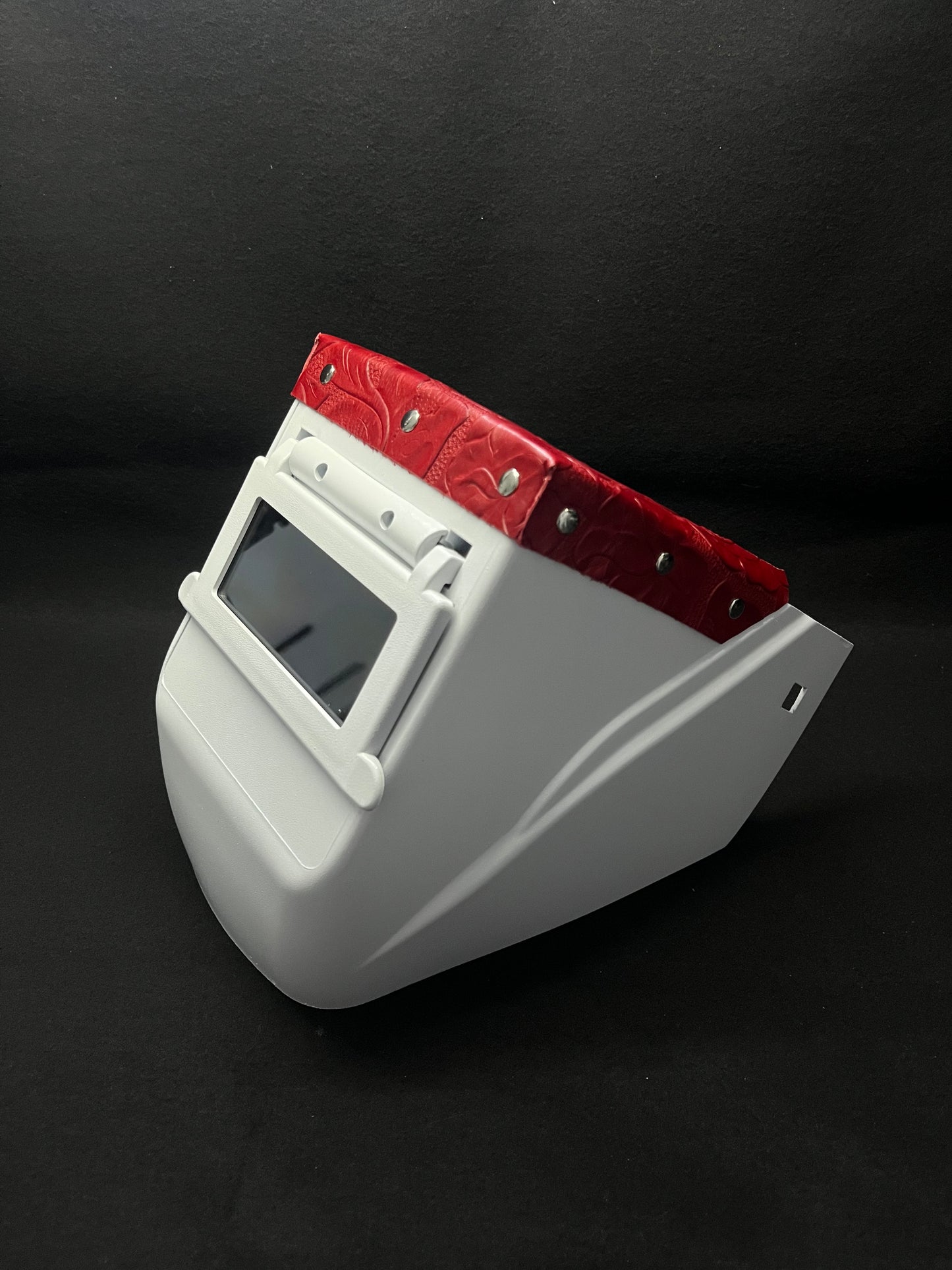 White hood with a red floral top